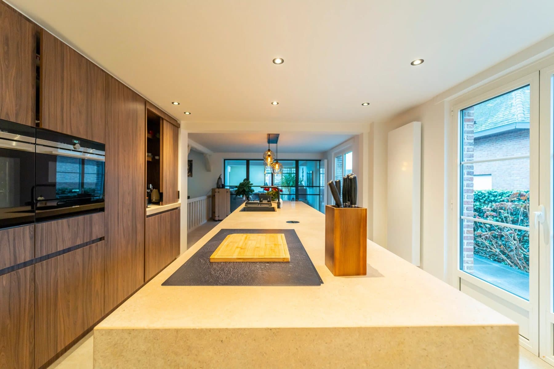 Kitchen with wooden cabinets and a long island