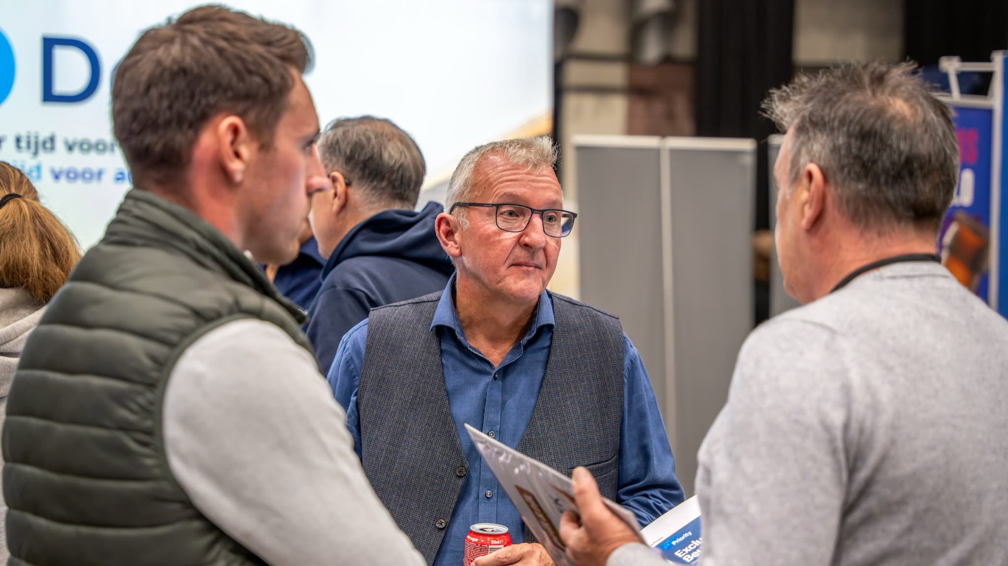 A conversation with visitors at the stand