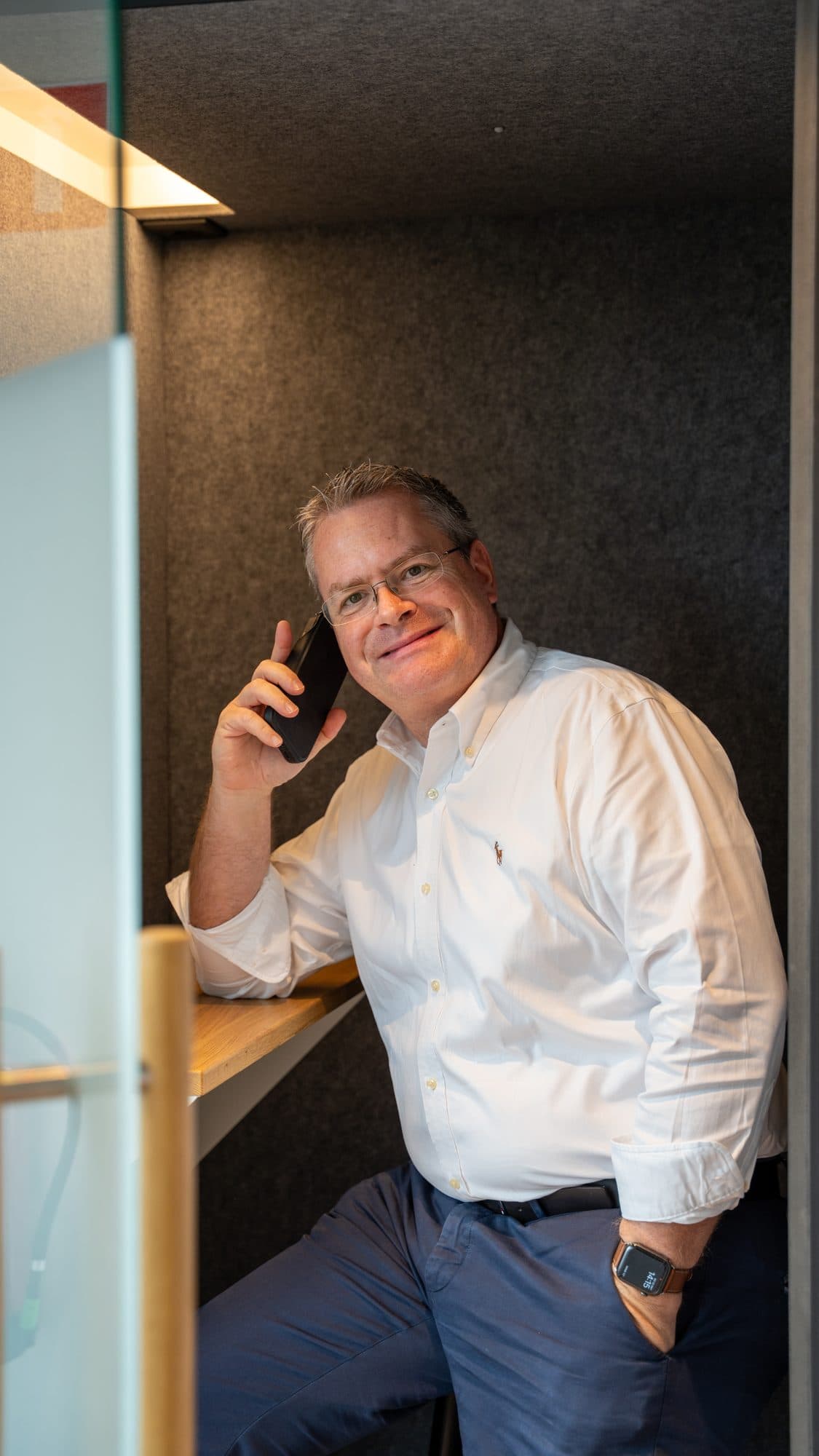 Xavier of Heart of Talent calling from a phone booth